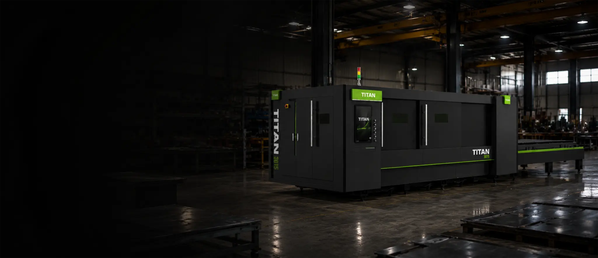 Titan F3015B side-door dual-shuttle flatbed fibre laser supplied and installed in a UK fabrication workshop — enclosed production platform